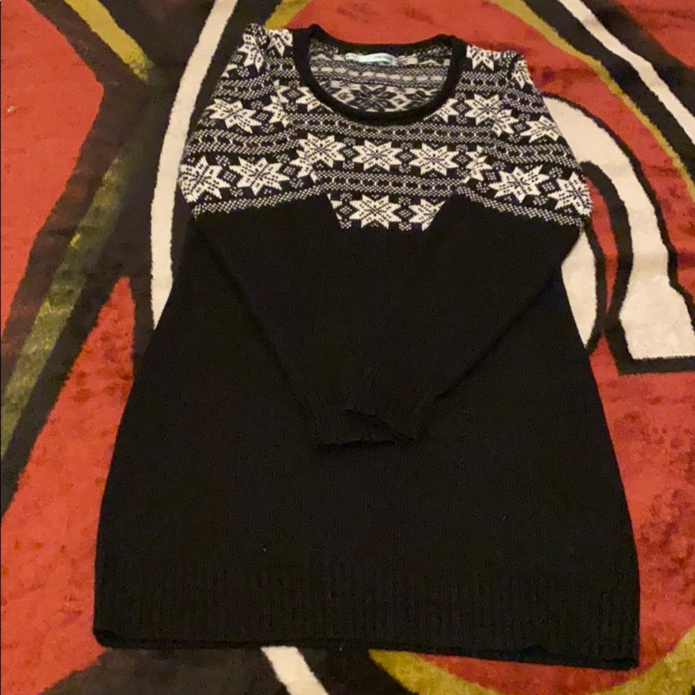 A black Christmas sweater like dress
